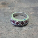 Anillo cintillo de plata con piedras